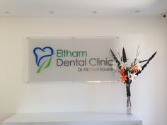 dental clinic logo glass sign